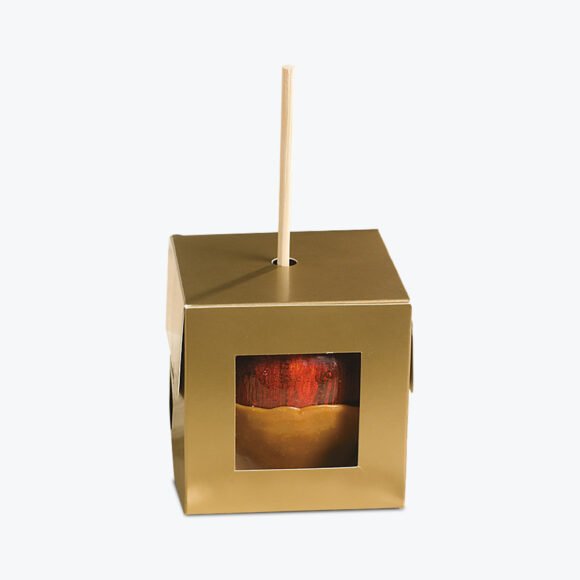 Elegant gold caramel apple box with a clear window and stick insert for secure packaging.