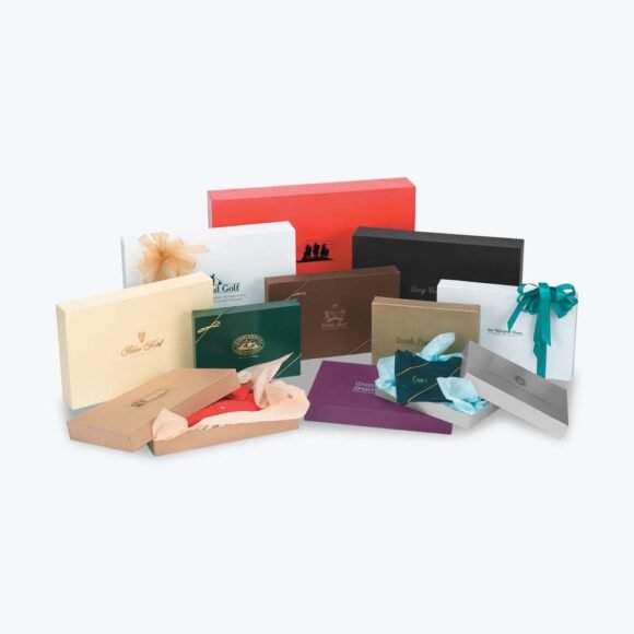 A variety of custom pop-up gift boxes in different sizes, colors, and designs, perfect for retail, events, and corporate packaging needs.