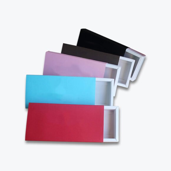 Colorful sleeve boxes with sliding covers in black, pink, blue, and red, designed for custom packaging solutions.