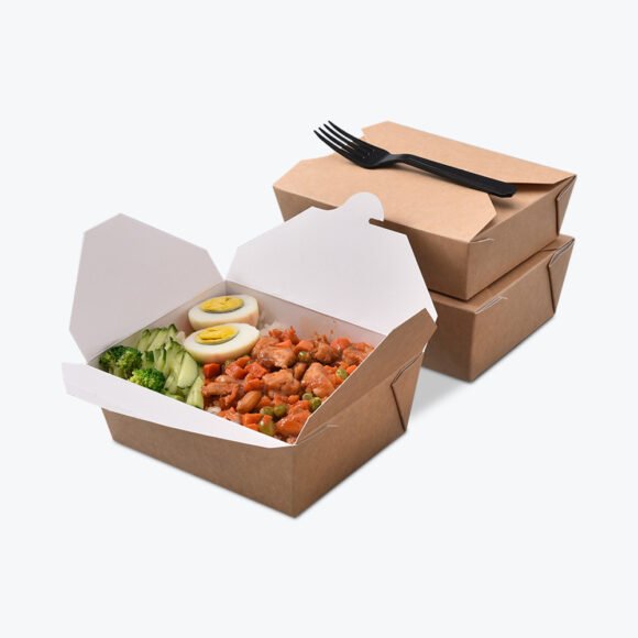 Kraft personalised takeaway box filled with fresh salad, vegetables, chicken, and boiled eggs, displayed with a black fork.