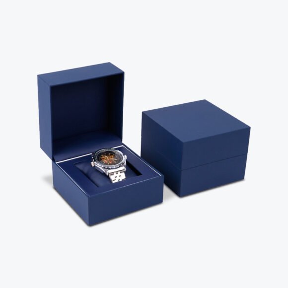 Custom luxury watch case boxes with insert in sleek navy blue, featuring a stylish watch securely placed in the custom insert.