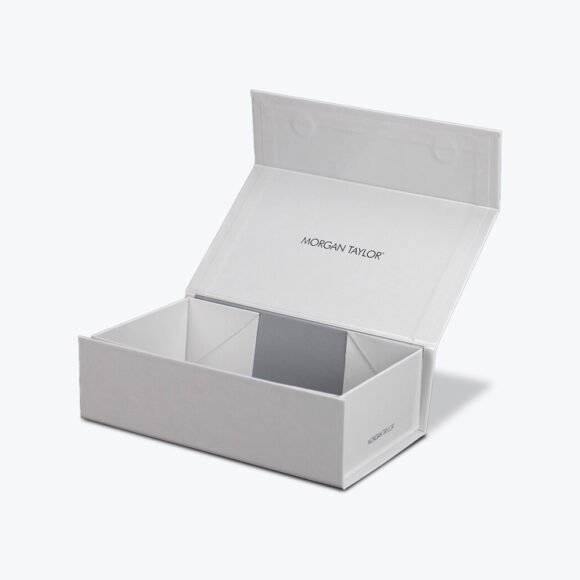 Premium white folding set-up style apparel box with lid, featuring Morgan Taylor branding, ideal for elegant packaging solutions.