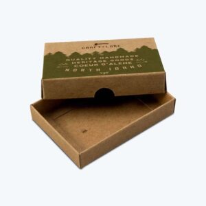 Custom two-piece apparel box made of eco-friendly kraft paper with a unique sliding drawer design and branded printing.