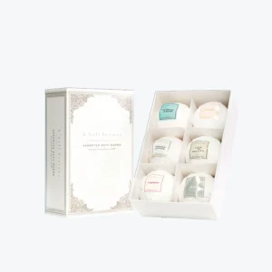 Custom bath bomb boxes in luxury gift packaging with assorted bath bombs in divided box compartments