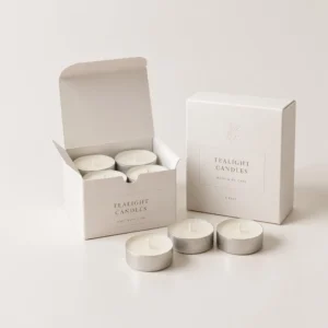 Tealight candle boxes in white cardboard packaging with custom printing and compact candle layout