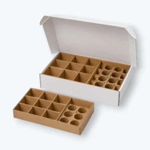 Custom Box Dividers inside an open packaging box with cardboard compartments for organized product separation