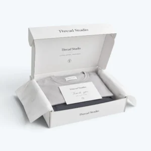 Apparel mailers with custom white clothing box and folded t-shirt packaging