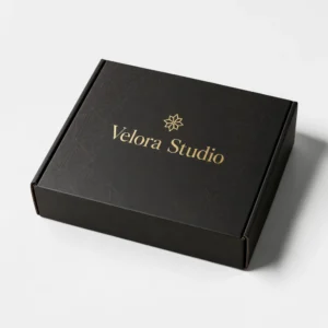 Black mailer boxes with gold foil branding for luxury product packaging