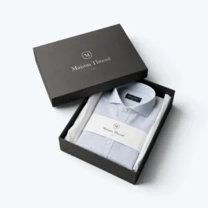 Custom boxes for shirts with premium black rigid packaging and folded dress shirt