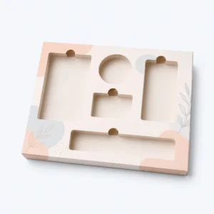 Ecommerce boxes with inserts featuring printed tray compartments for branded product arrangement
