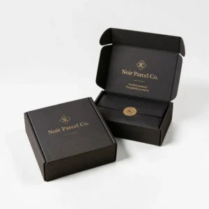 Mailer boxes small in black cardboard with gold logo printing for luxury packaging