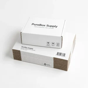 White mailer boxes stacked for wholesale cardboard packaging and shipping