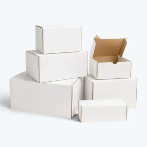 White shipping boxes in multiple sizes with clean corrugated packaging style